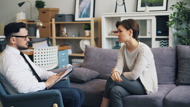 Chiropractor and patient reviewing a care plan
