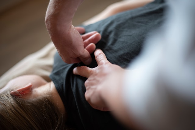 Chiropractor performing a chiropractic adjustment